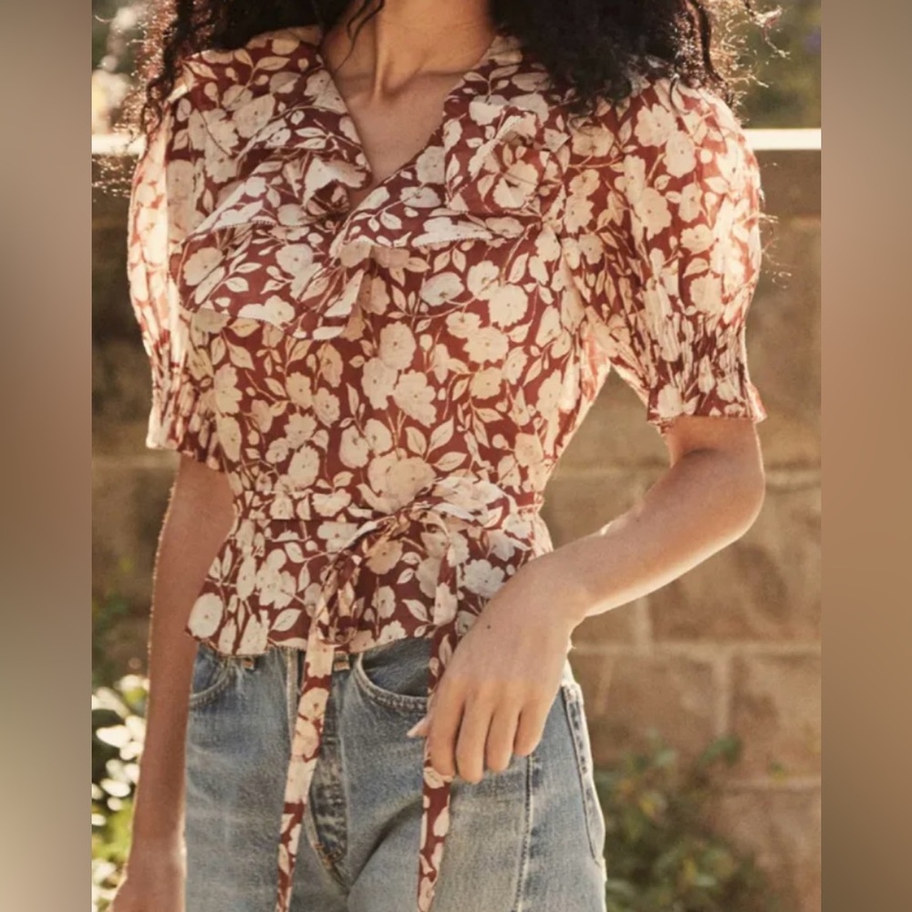 DÔEN Rimbaud top in a red floral print with ruffles.